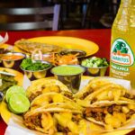 Tacos al pastor en una mesa: pizza frente a tacos en el reparto a domicilio